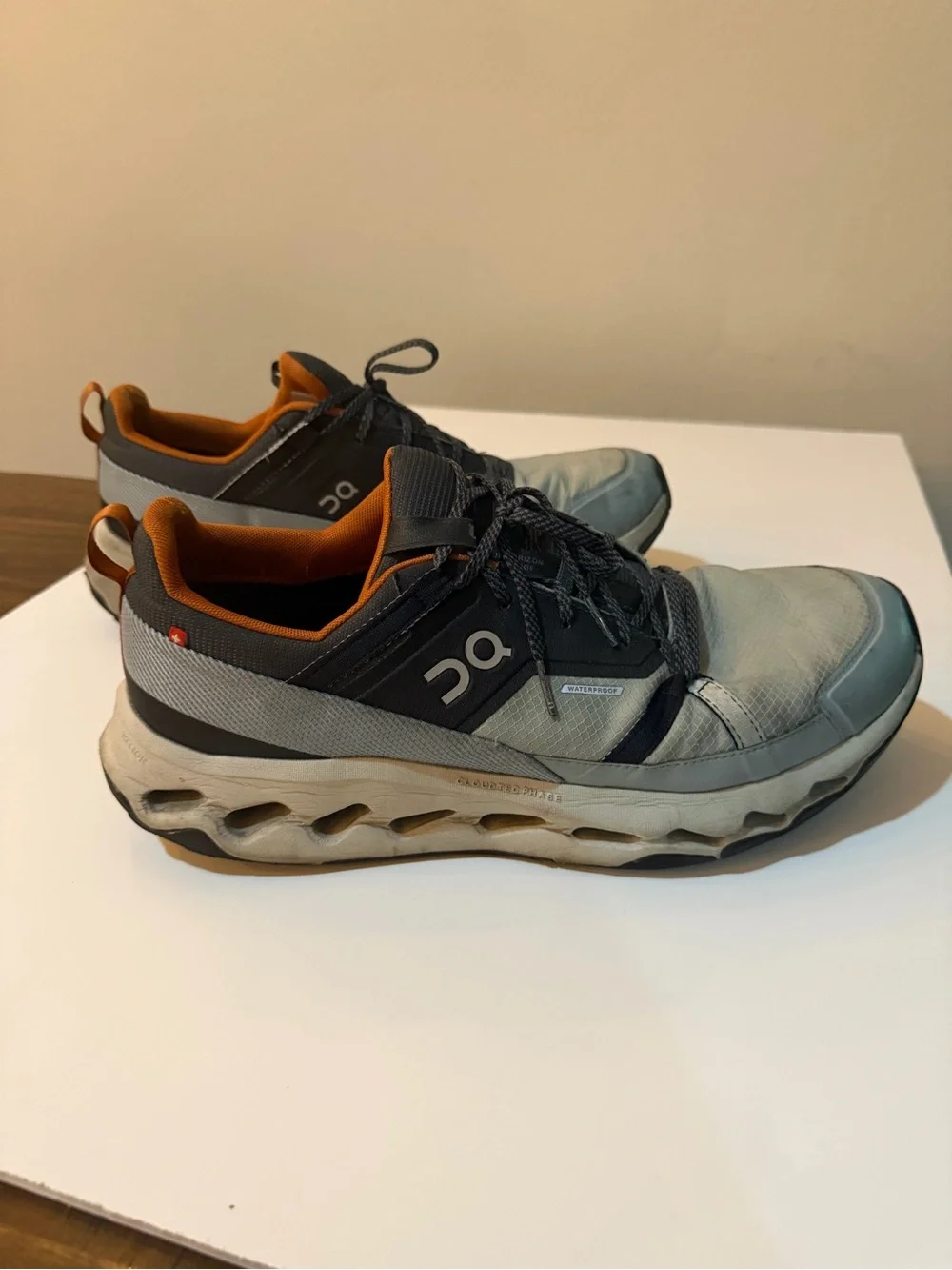 On Running Men’s Cloudace Sneakers in Grey with Orange Trim